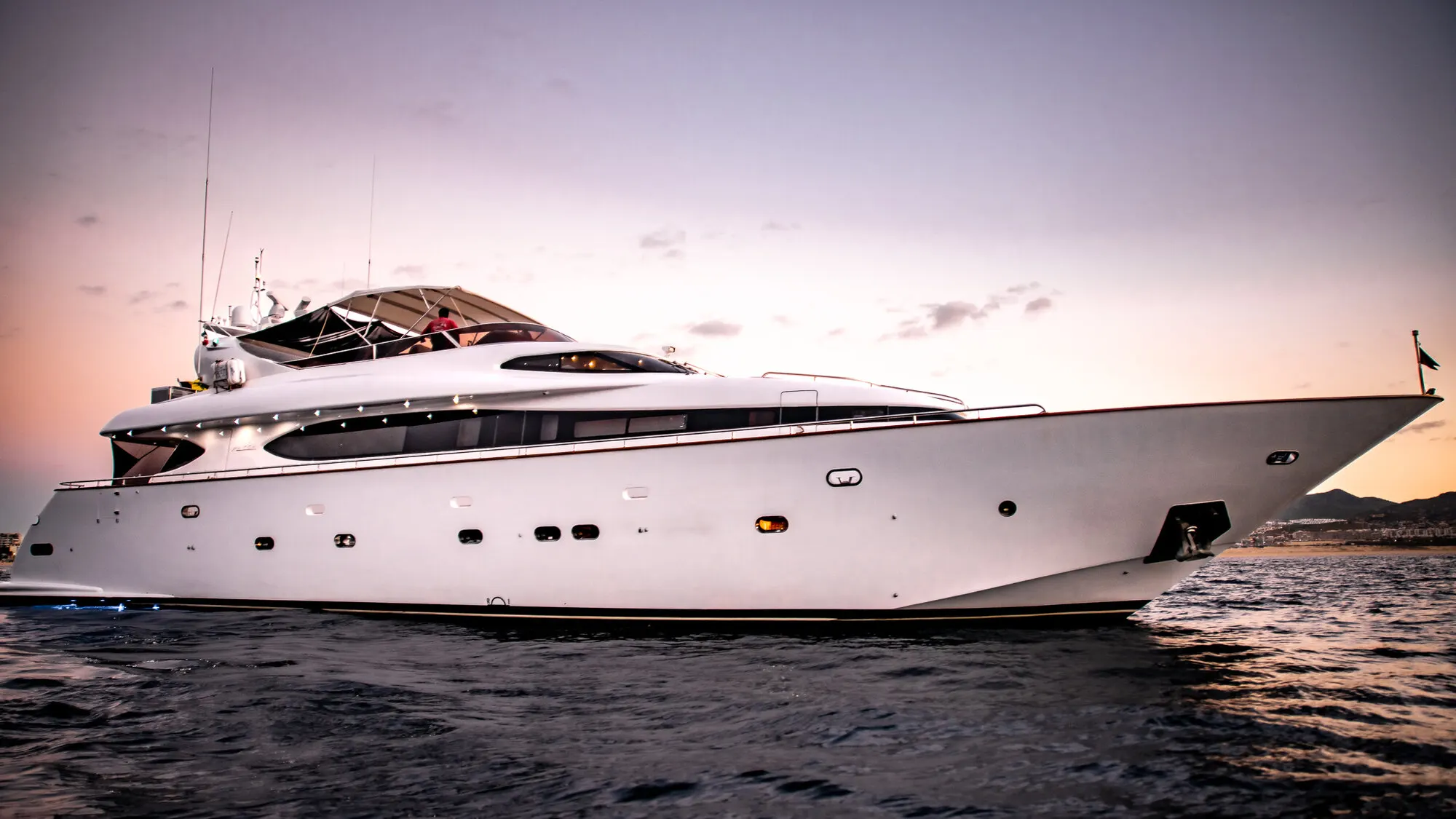 Close on the hull and the decks under a pale sky